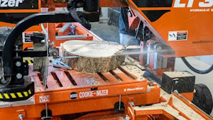 Зажимное приспособление CookieMizer для переносных пилорам от Wood-Mizer  